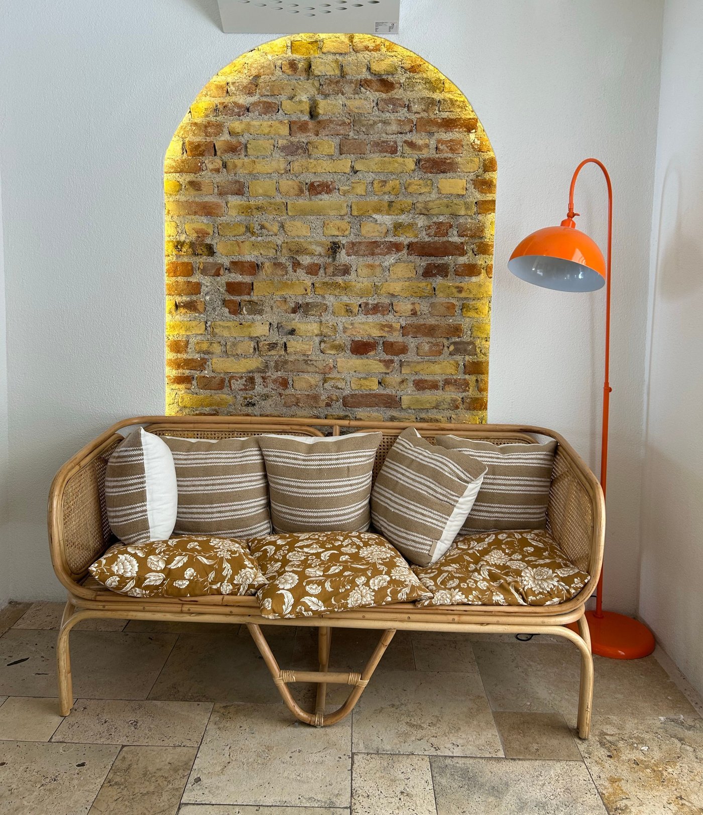 Natural Cane 2-Seater Loveseat Sofa with Botanical Print Cushions